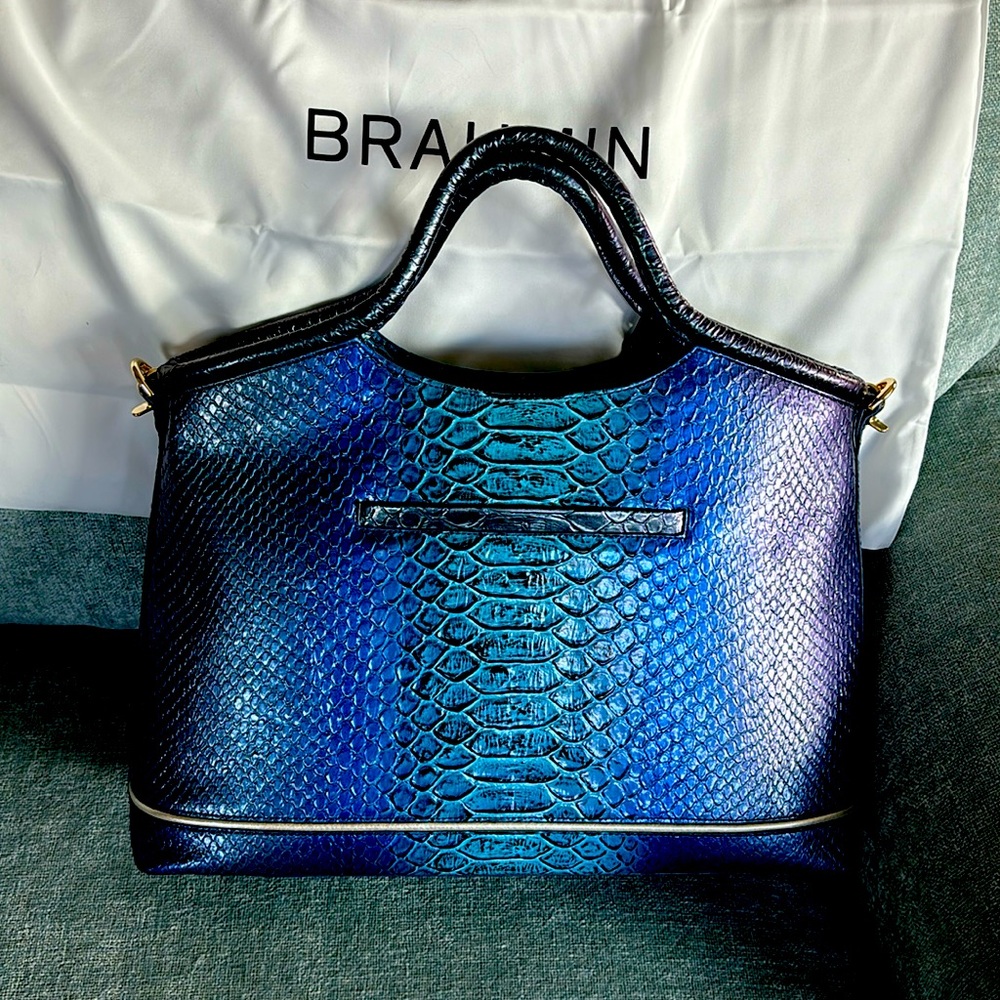 Selling because I discovered this satchel is just larger than I need.